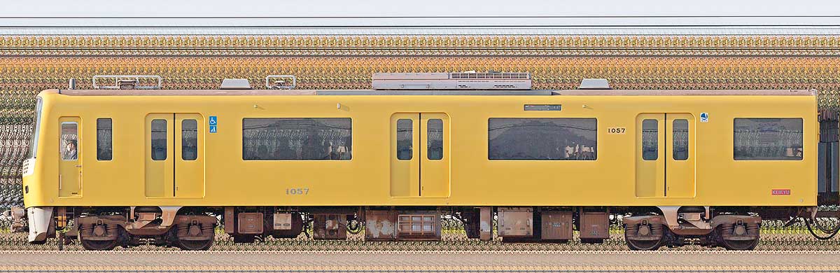 京急電鉄 新1000形（4次車）デハ1057「京急イエローハッピートレイン」海側の側面写真