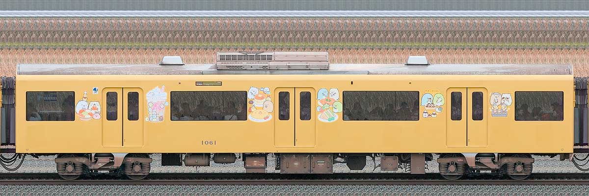 京急電鉄 新1000形（4次車）デハ1061「京急イエローハッピートレイン たべものもぐもぐ号」山側の側面写真