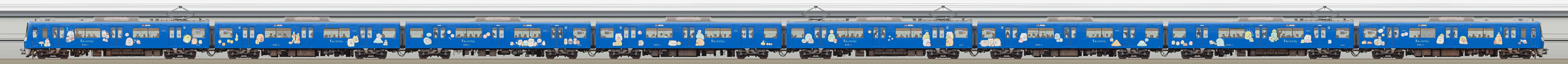 京急電鉄 600形（3次車）606編成「京急ブルースカイトレイン すみっコなかま号」（海側）の編成サイドビュー