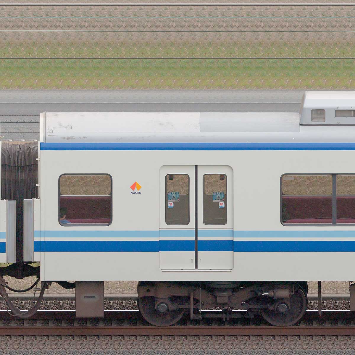 泉北高速7000系サハ7601（南海マーク）の側面写真｜RailFile.jp